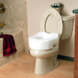 A raised toilet seat